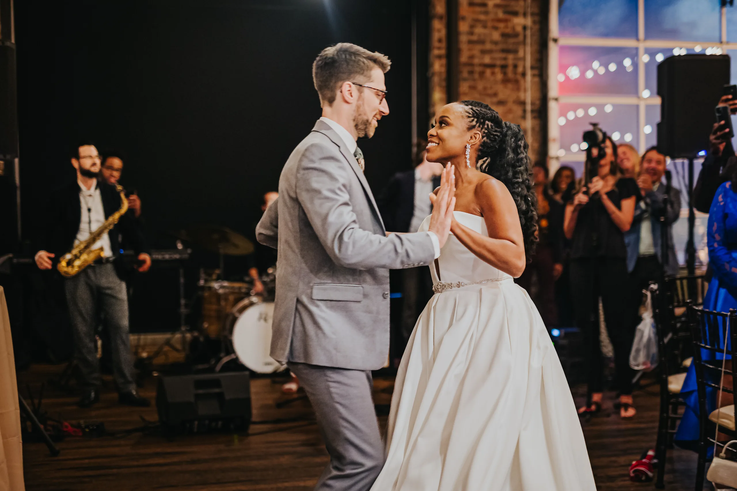First Dance: their first dance with the band playing behind them, at their wedding at Terminus 330 in Atlanta, GA