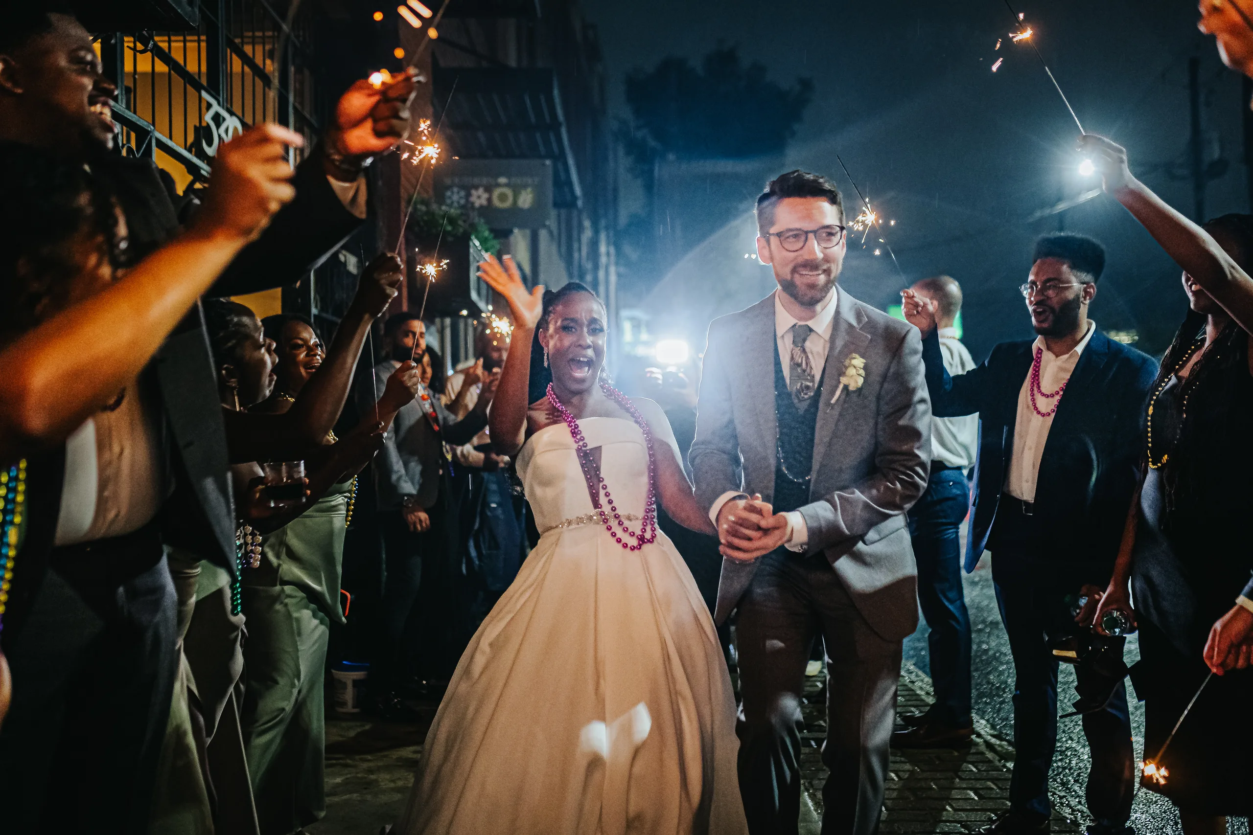 Send-Off: cheering through the sparklers, at their wedding at Terminus 330 in Atlanta, GA