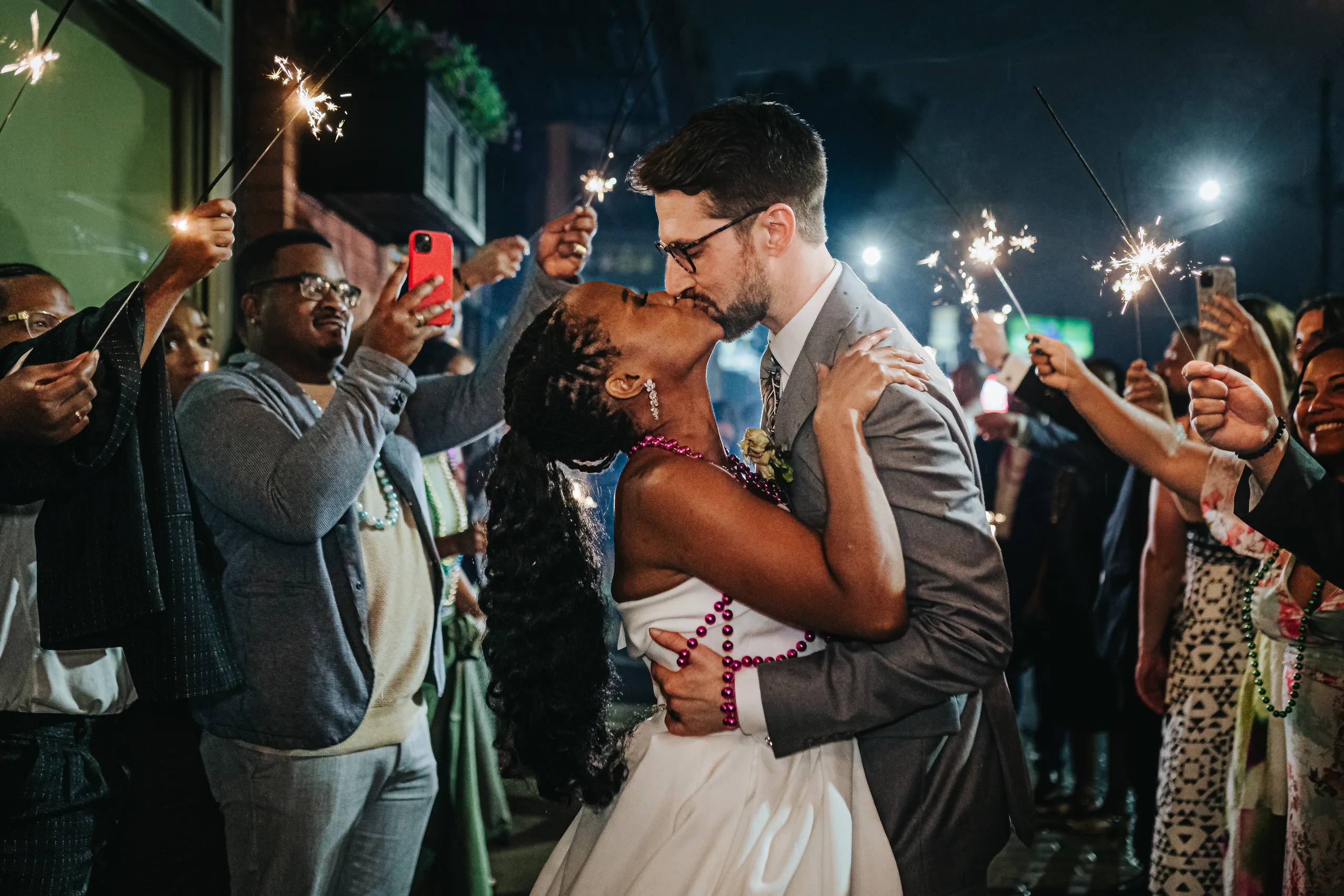 Send-Off: a kiss in the middle of the sparklers, at their wedding at Terminus 330 in Atlanta, GA