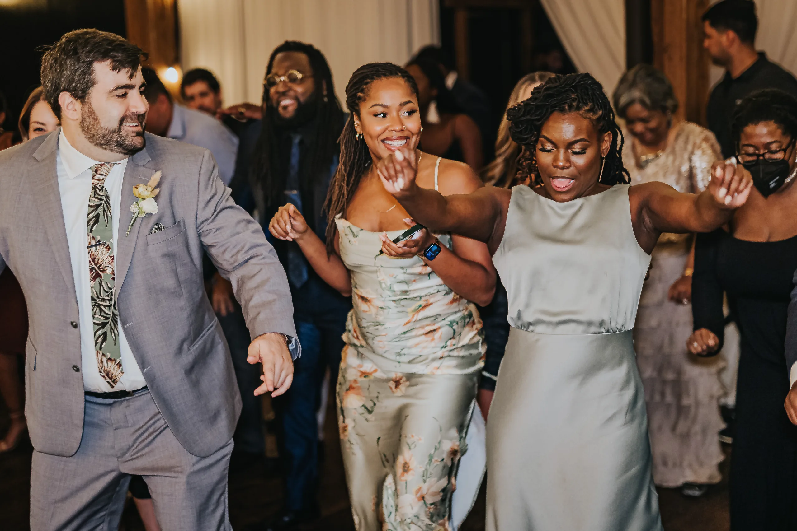 Reception: the wedding party dancing, at their wedding at Terminus 330 in Atlanta, GA