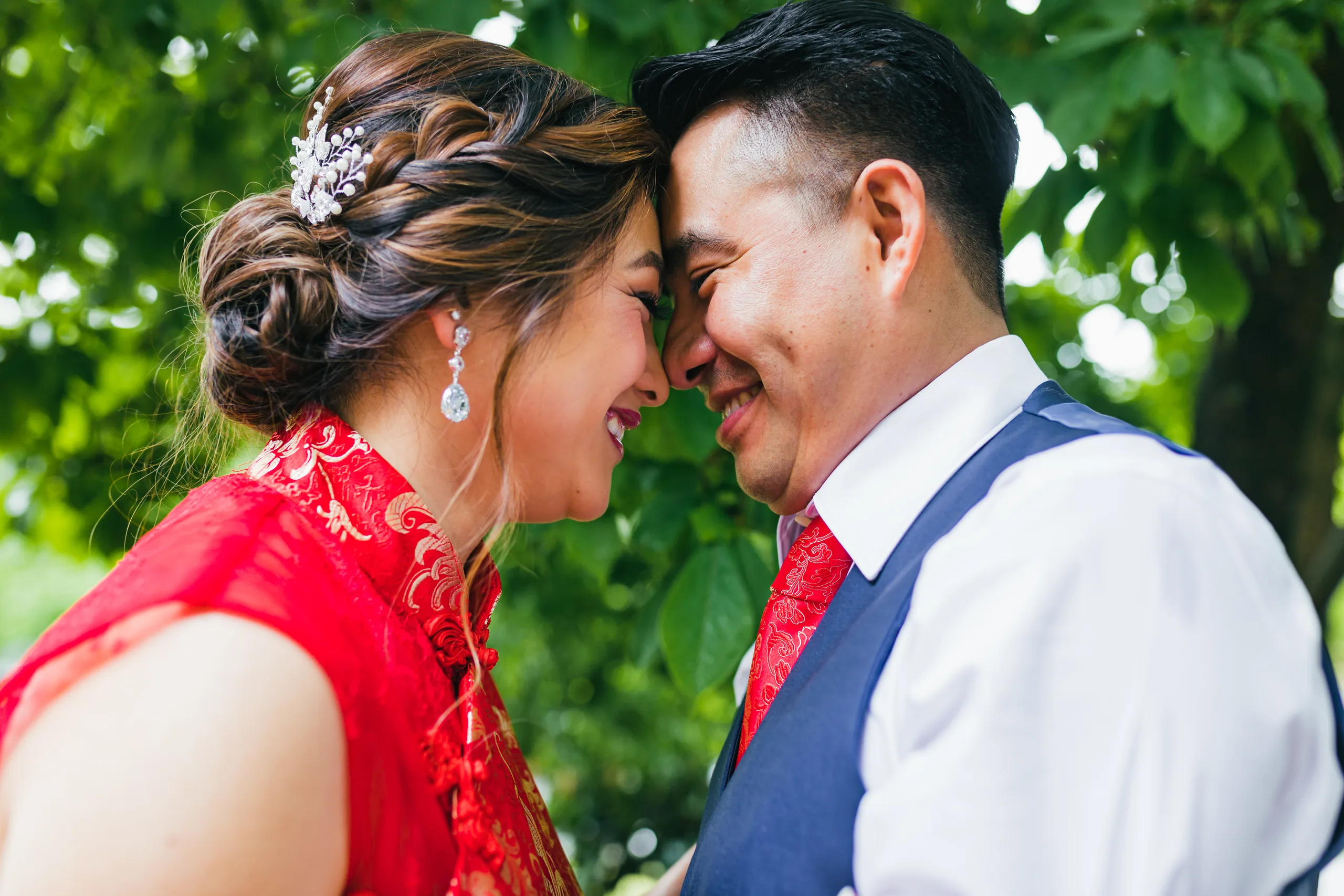 Tea Ceremony: forehead to forehead in the garden before their wedding at the Payne-Corley House in Duluth, GA