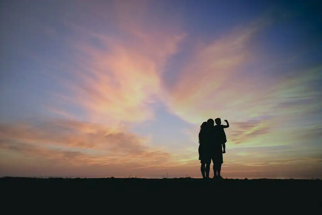 Maternity session silhouette at sunset at Galts Ferry Landing in Acworth, Georgia