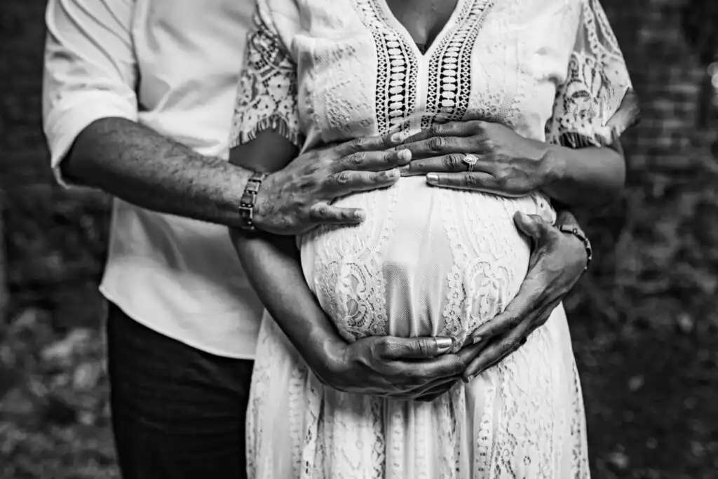 Black and white maternity session at Roswell Mill waterfall, Roswell, Georgia